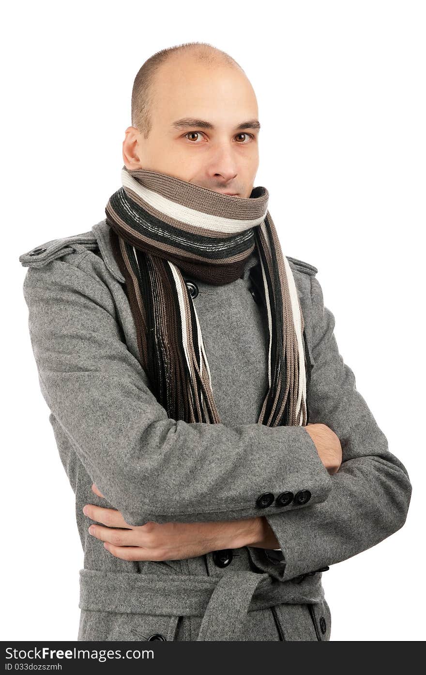 Portrait of handsome man in scarf and coat. Isolated on white background