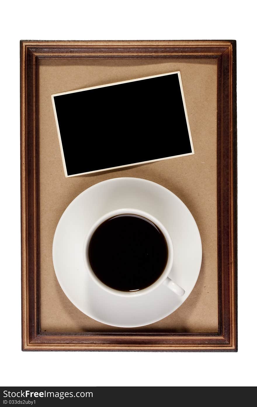 Wooden frame with paper craft in the background with a cup of coffee.