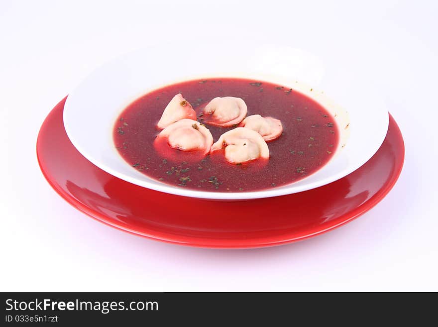 Traditional polish Christmas Eve dish: clear borscht with uszka (a mushroom filled kind of dumplings). Traditional polish Christmas Eve dish: clear borscht with uszka (a mushroom filled kind of dumplings)