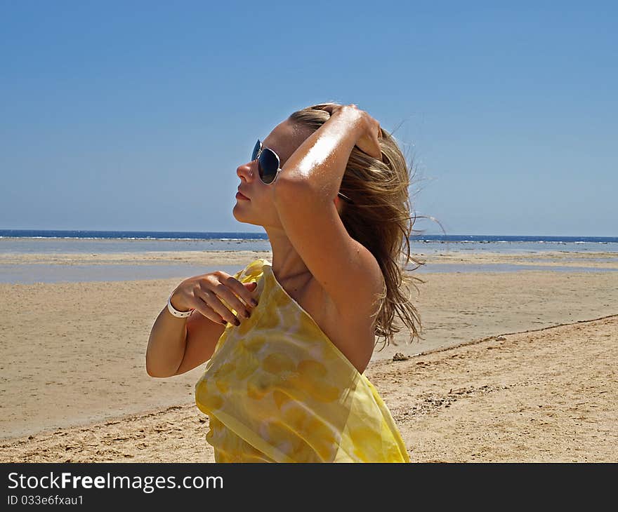 The young girl on a beach