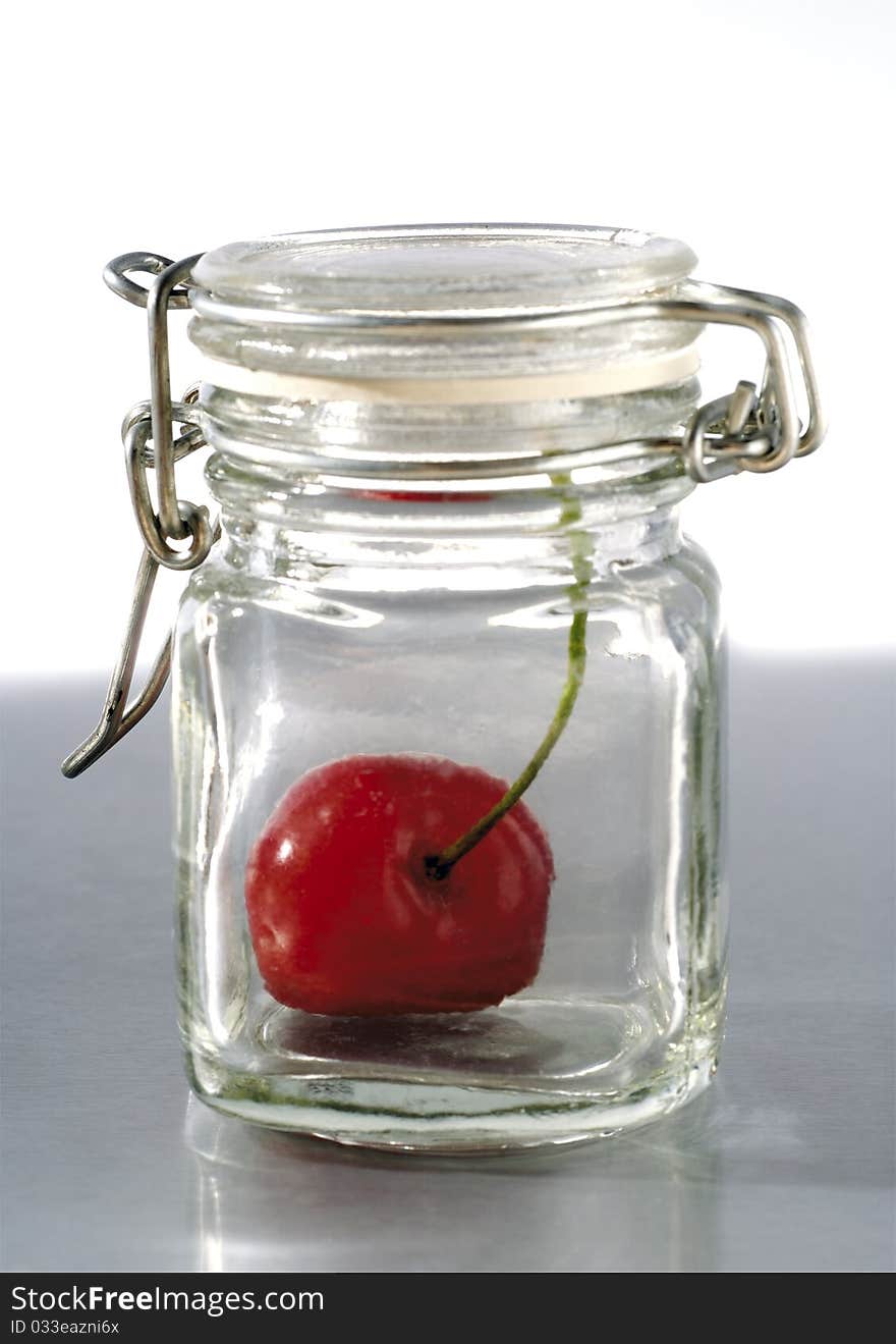 Enclosed in a sealed jar cherry