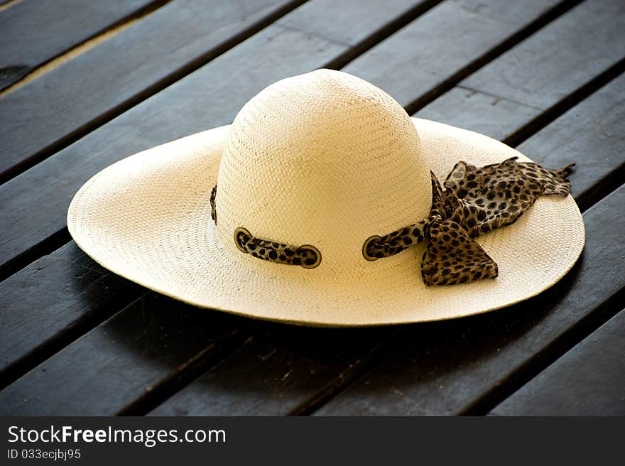 Women S Sun Hat On The Wooden Decking