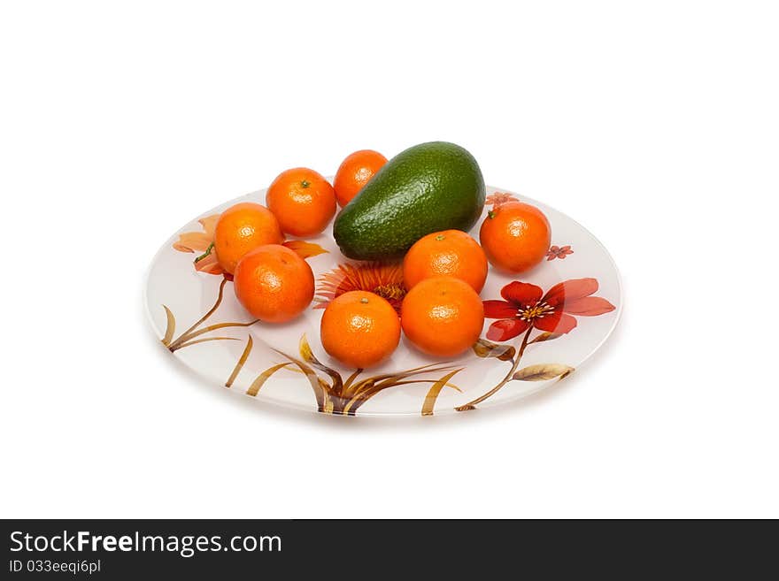 Plate on a white background with mandarins. Plate on a white background with mandarins