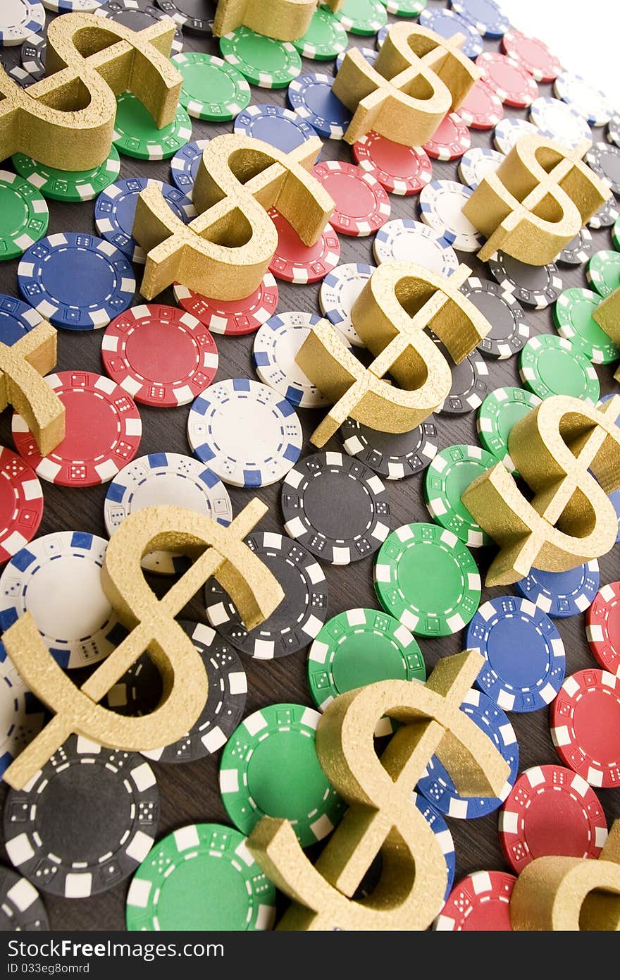 Multi - colored gambling chips and US dollar sign on a background