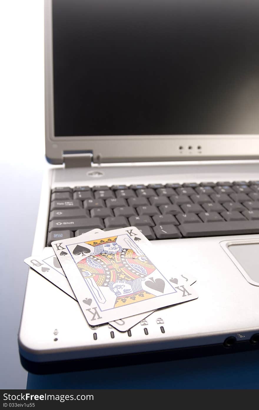 Close-up of Poker cards and gambling chips on green background. Close-up of Poker cards and gambling chips on green background