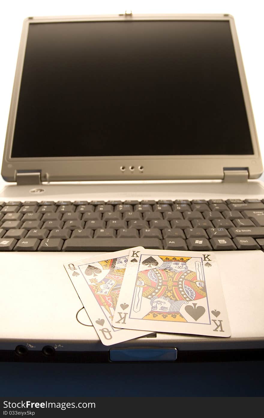 Close-up of Poker cards and gambling chips on green background. Close-up of Poker cards and gambling chips on green background