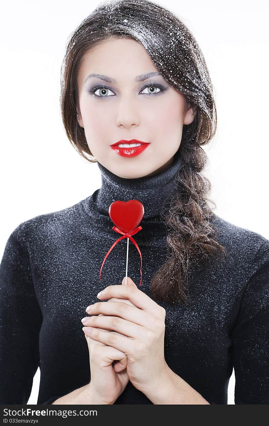 Beautiful smiling woman with heart on white background