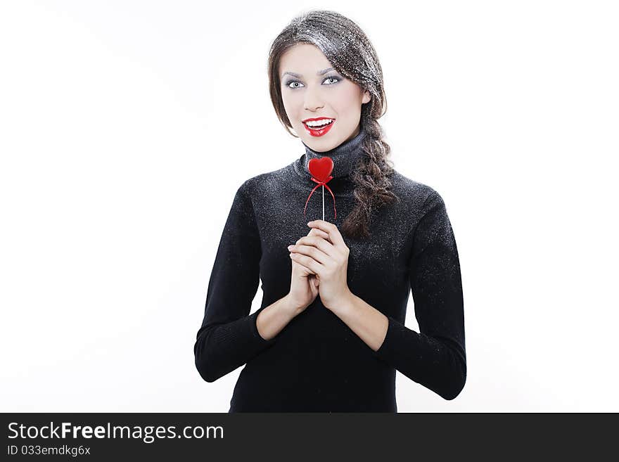 Beautiful smiling woman with heart on white background