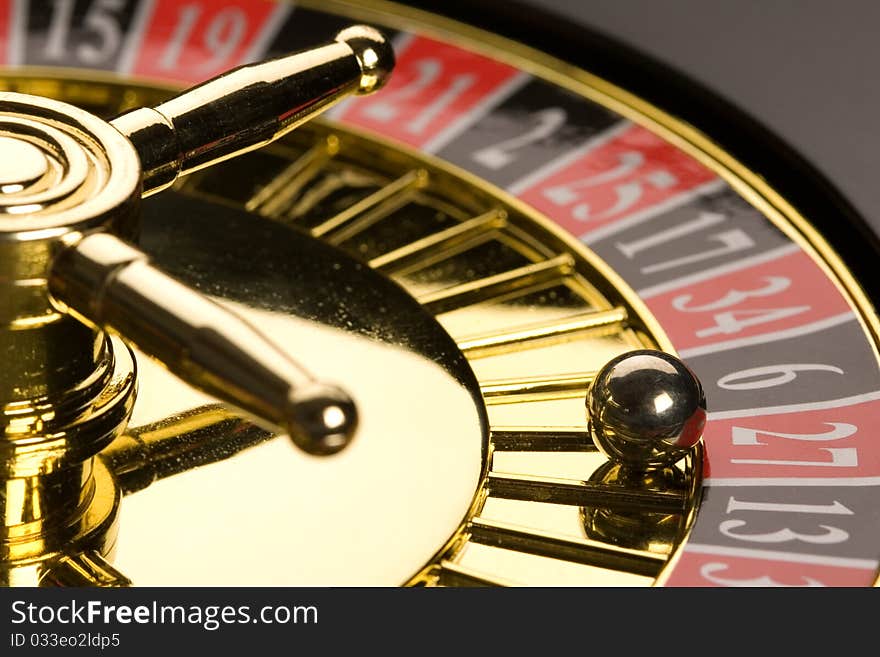 Close-up of Roulette on green background. Close-up of Roulette on green background