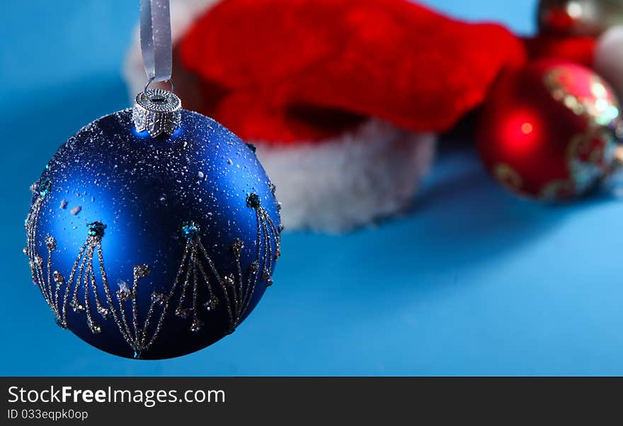 Christmas hat of santa claus and decoration balls. Christmas hat of santa claus and decoration balls