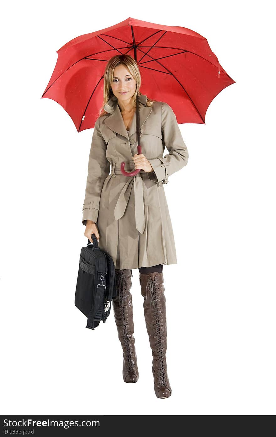 Happy smiling woman with her raincoat and umbrella. Happy smiling woman with her raincoat and umbrella