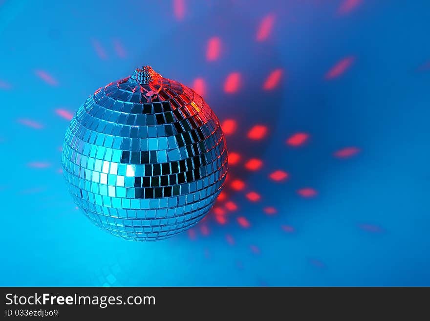 Disco ball on blue background