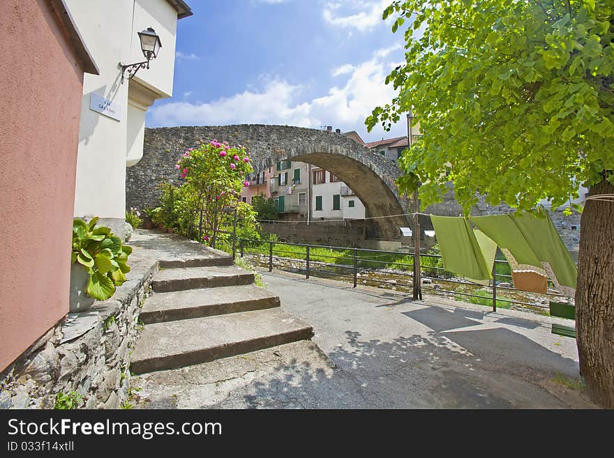 View the italian medieval town of varese ligure and its roma bridge