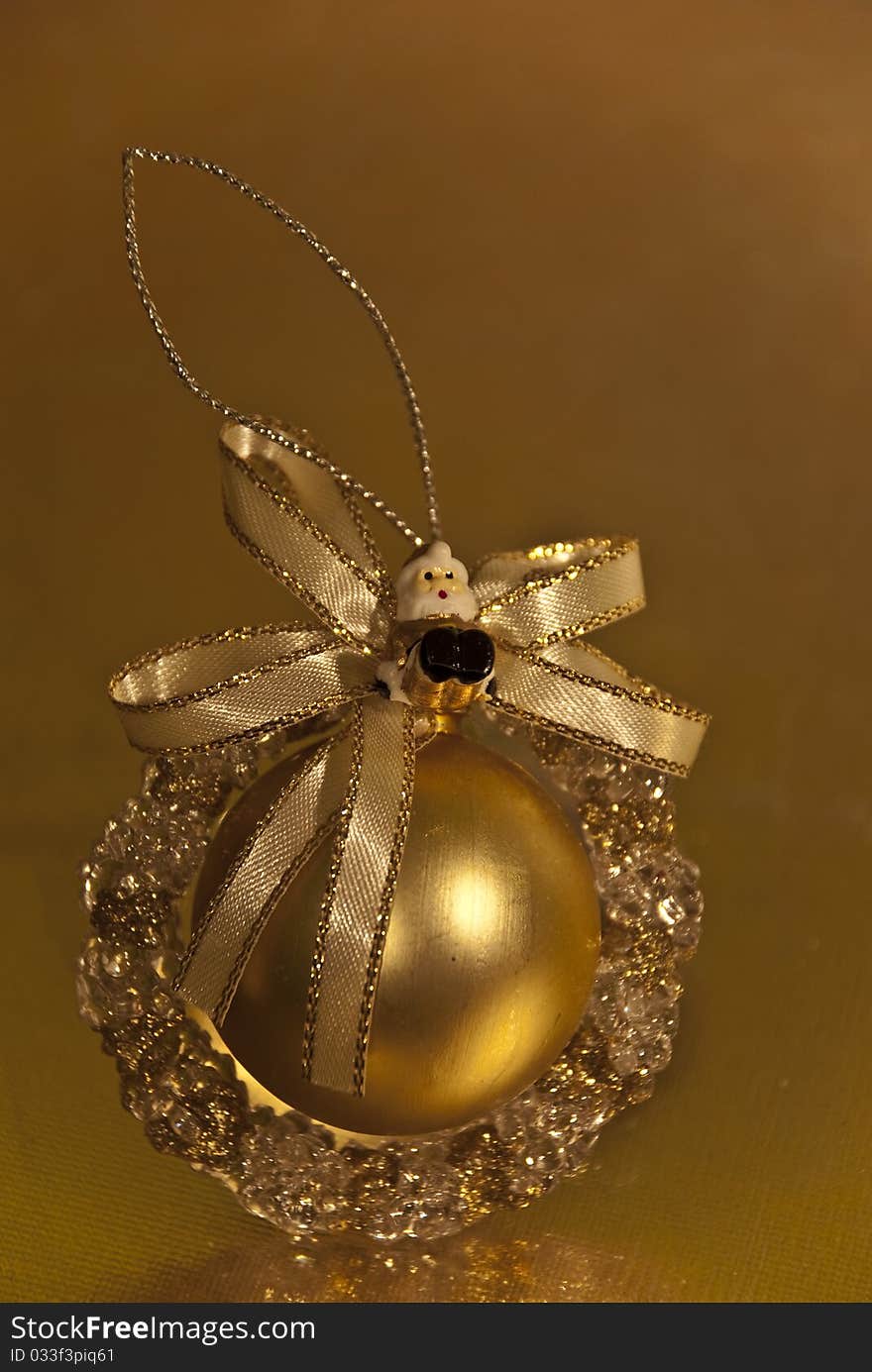 Image of a santa on golden christmas decoration ball. Image of a santa on golden christmas decoration ball