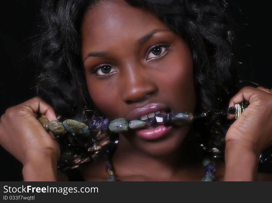 A sexy African American woman with jewelry. A sexy African American woman with jewelry