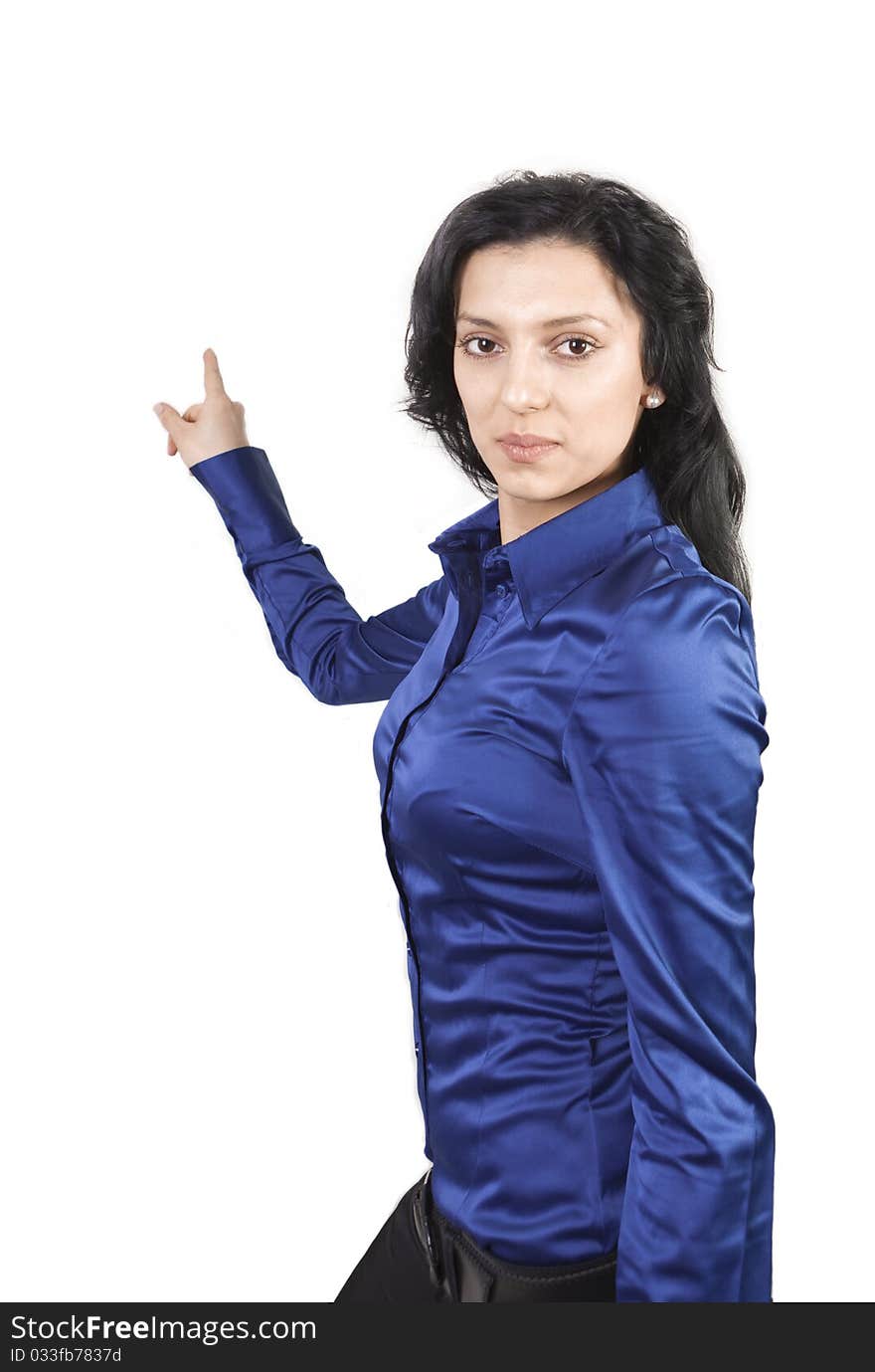 Portrait of young woman pointing with hand towards the background. Portrait of young woman pointing with hand towards the background