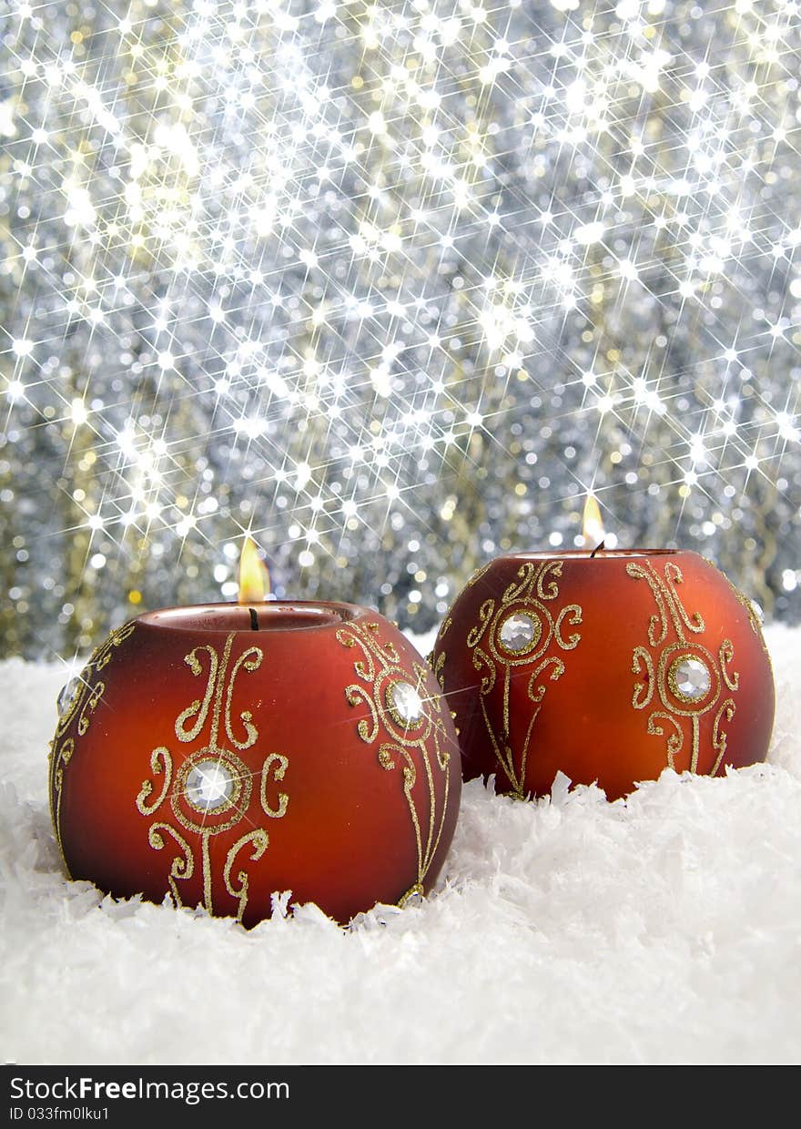 Christmas candles  with sparkling background