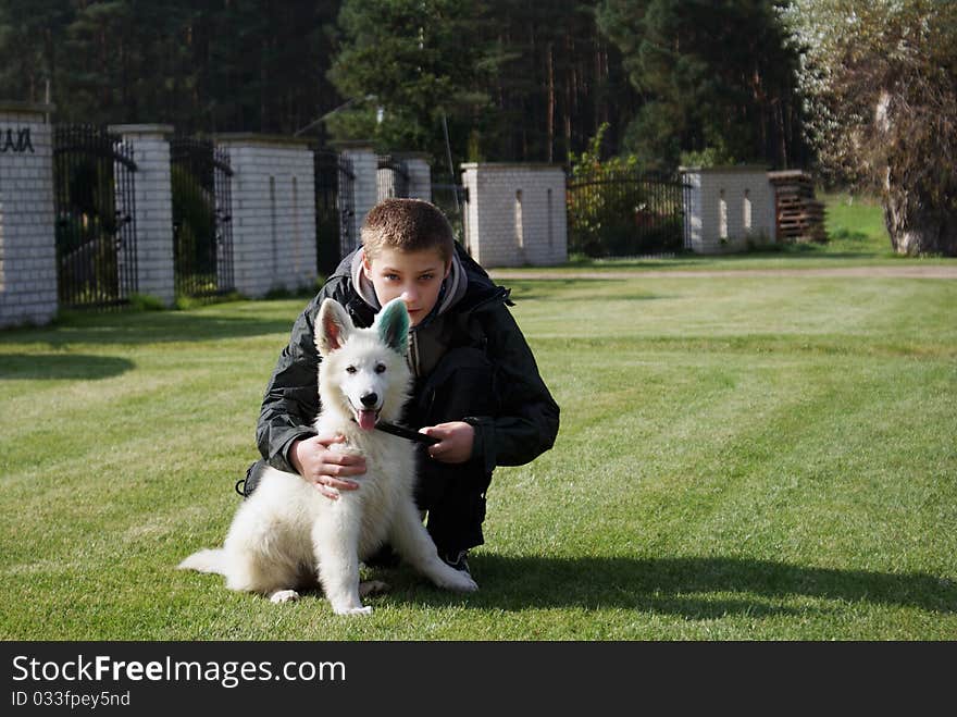 Boy with his lovely puppy