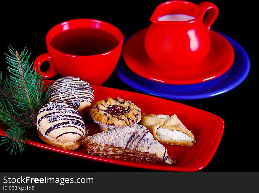 A tray of tea with milk, sugar and biscuits. A tray of tea with milk, sugar and biscuits