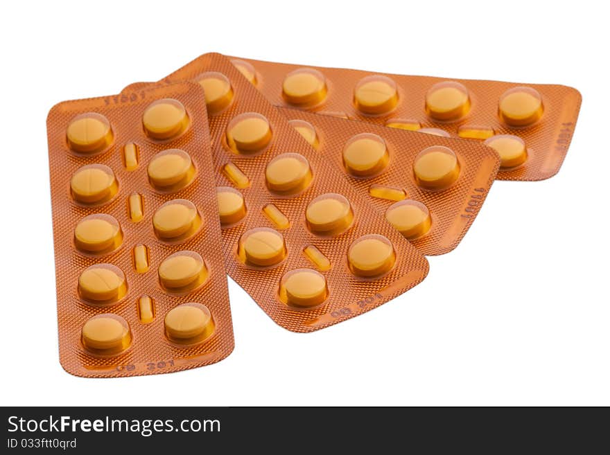 Group of three orange tablet blisters isolated at 15Mps. Group of three orange tablet blisters isolated at 15Mps