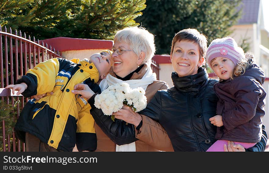 Portrait happy family outdoor in street