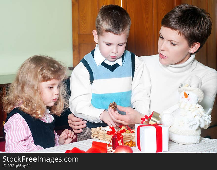 Happy Family preparing Christmas ornaments. Happy Family preparing Christmas ornaments