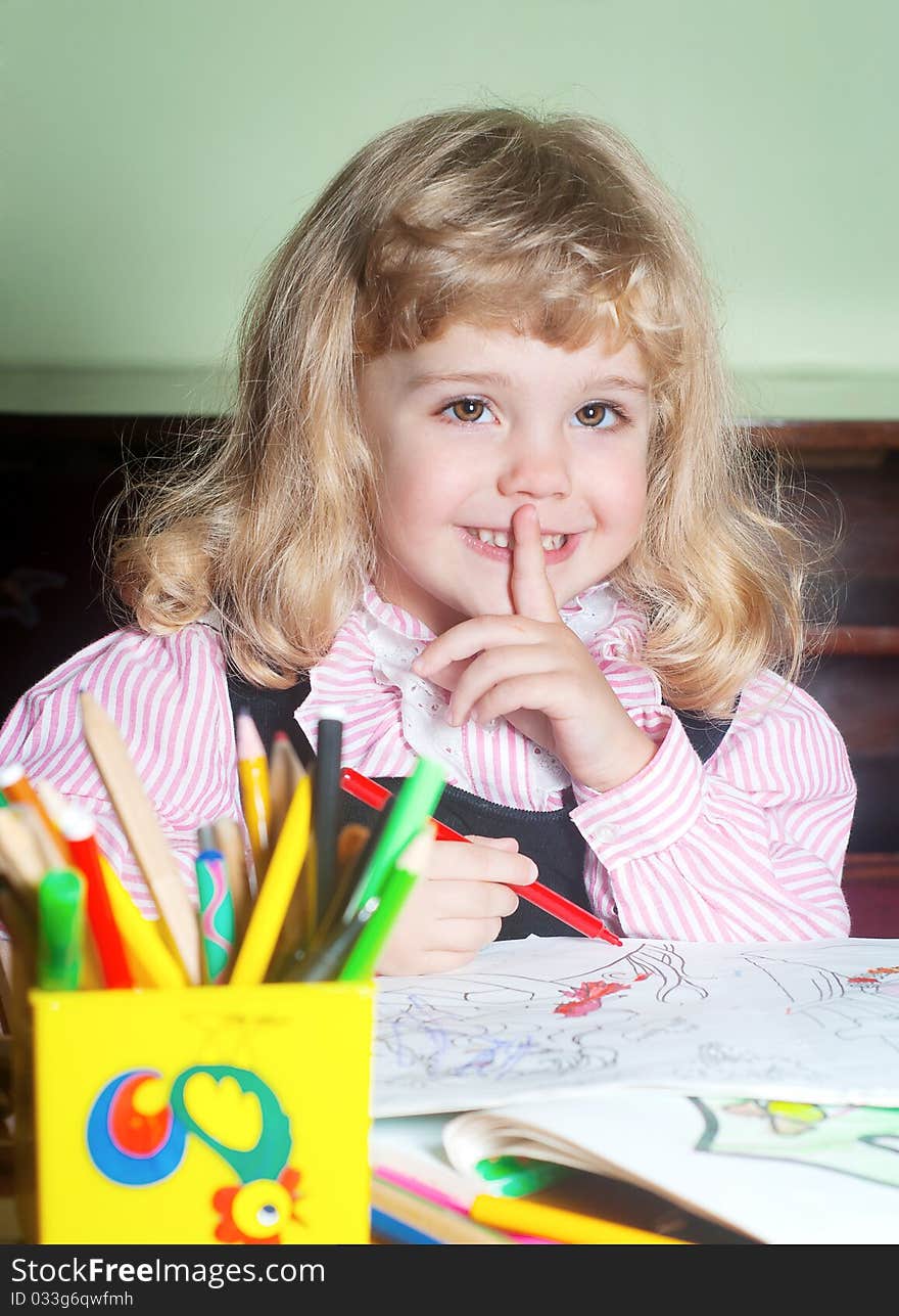 Portrait Cute little girl painting