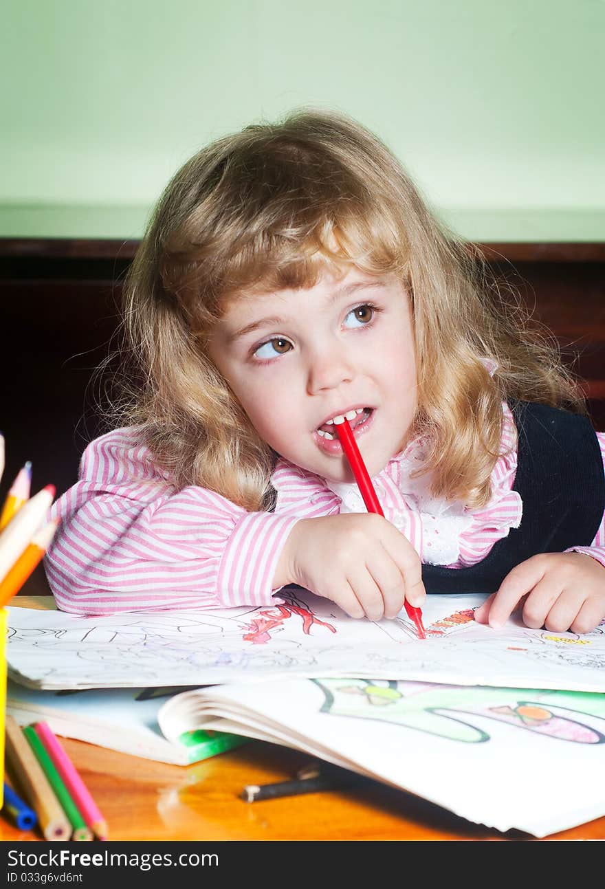 Portrait Cute little girl painting