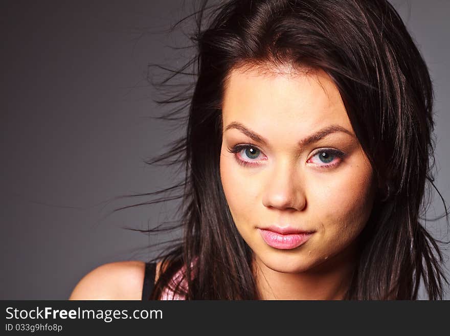 Girl looks pensively into the camera