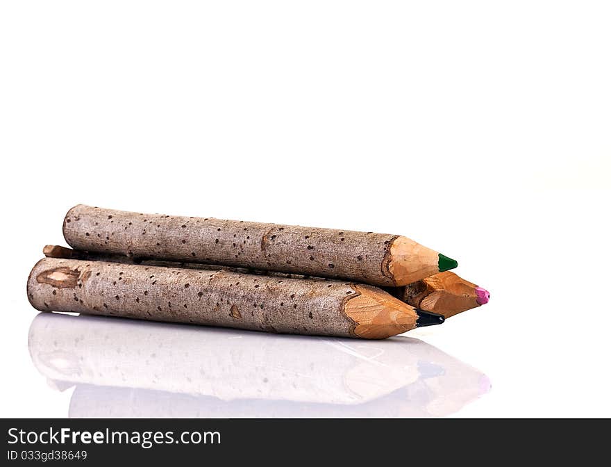 Tree color crayons, stacked on a pile. Tree color crayons, stacked on a pile