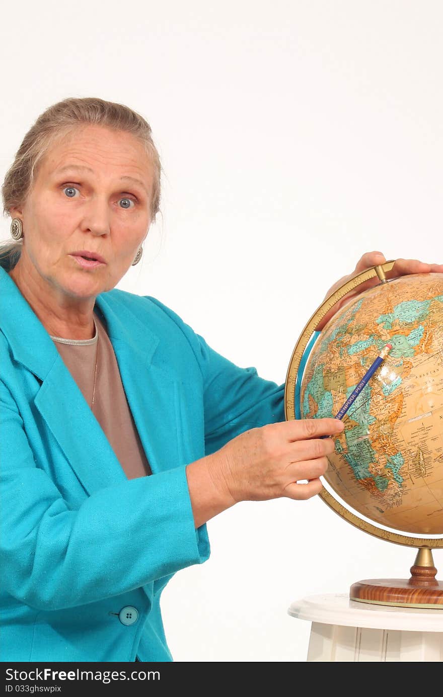 Mature woman with a globe