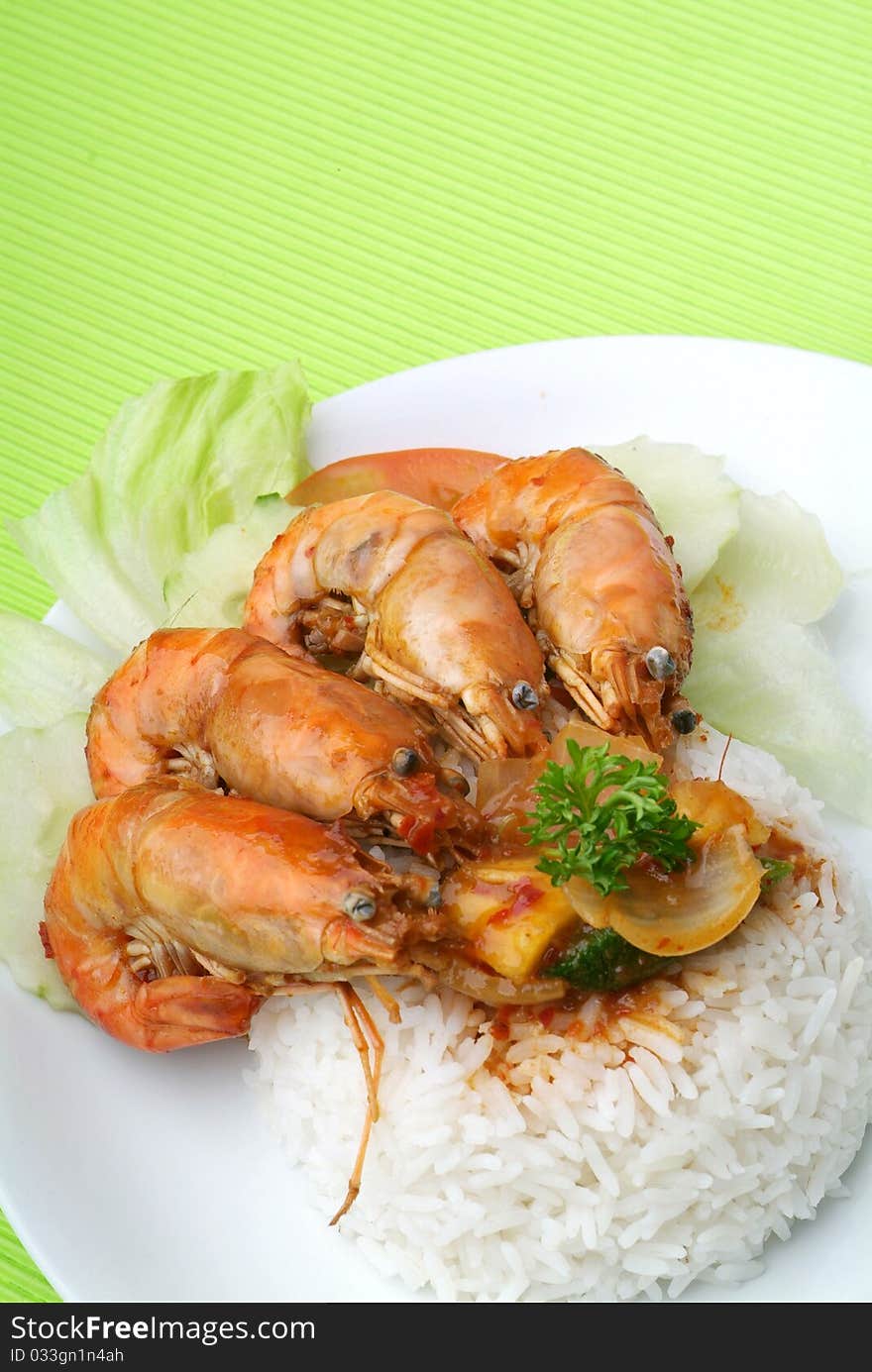 White rice with hot and spicy shrimps. White rice with hot and spicy shrimps