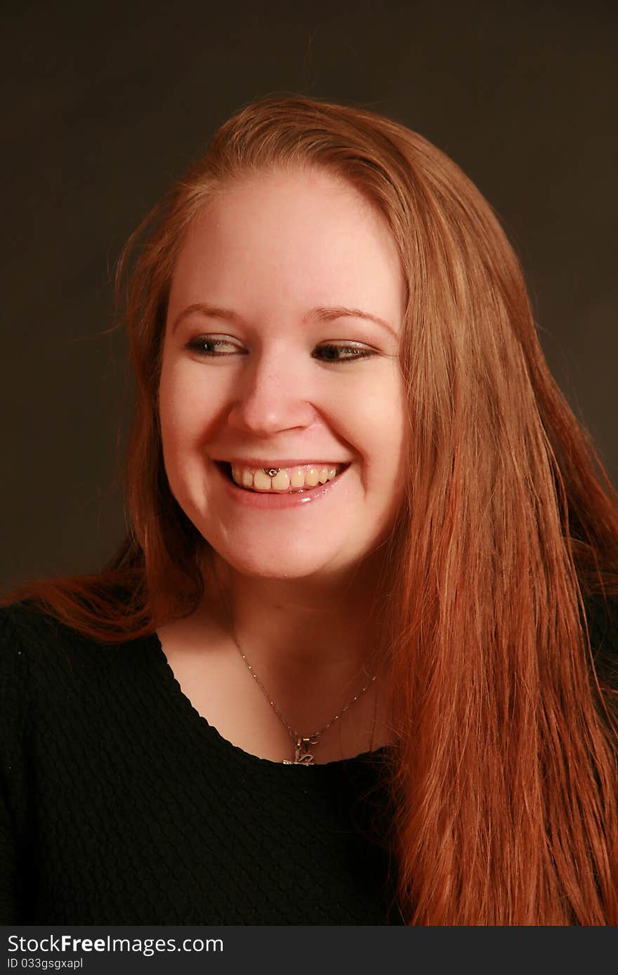 Portrait of a young woman, Studio. Part of a grimace series, same model, different emotions. Portrait of a young woman, Studio. Part of a grimace series, same model, different emotions.