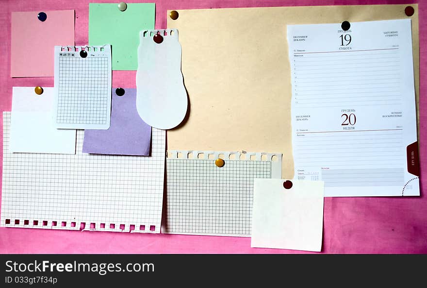 Color sheets on the pink bulletin board. Color sheets on the pink bulletin board