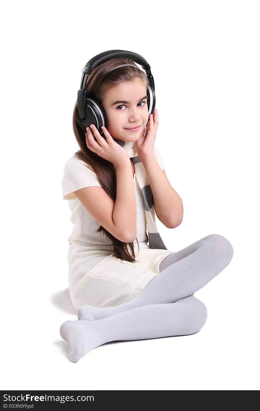 Little girl listening to the music