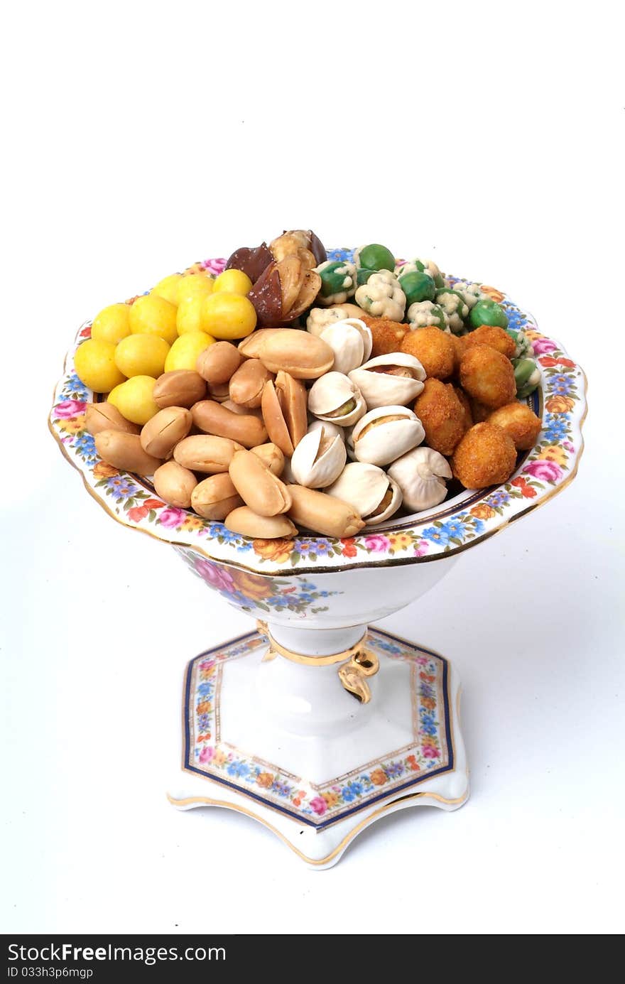 Assortment of asian nuts on jug