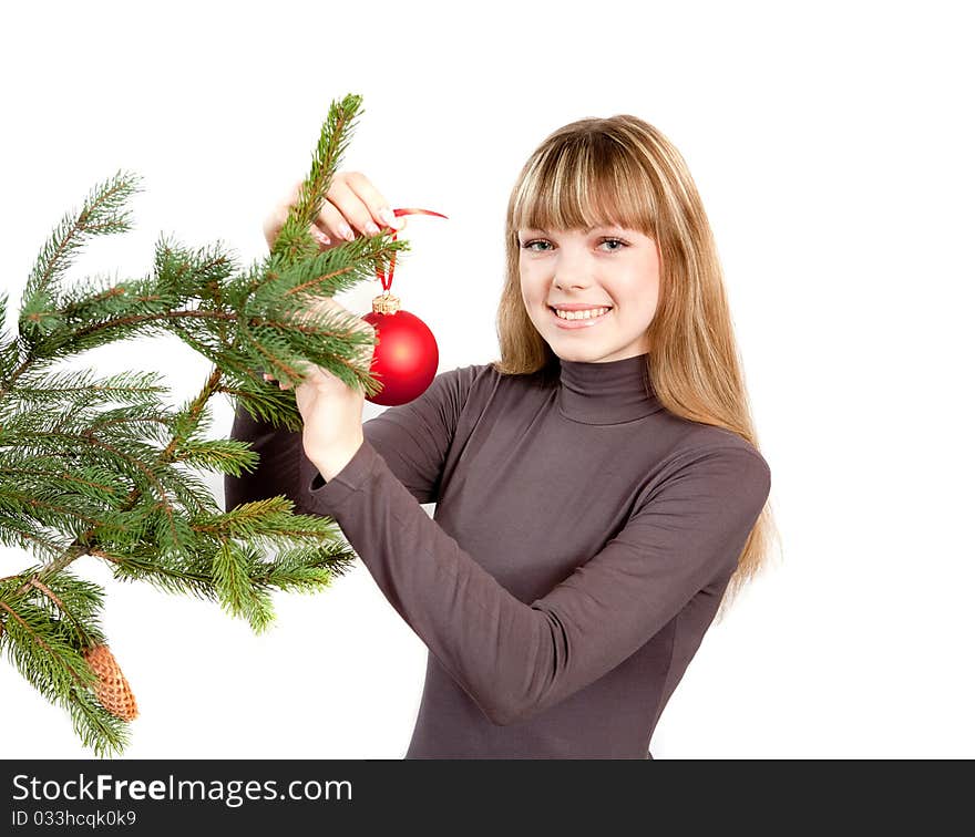 The Girl Decorating The Christmas Tree