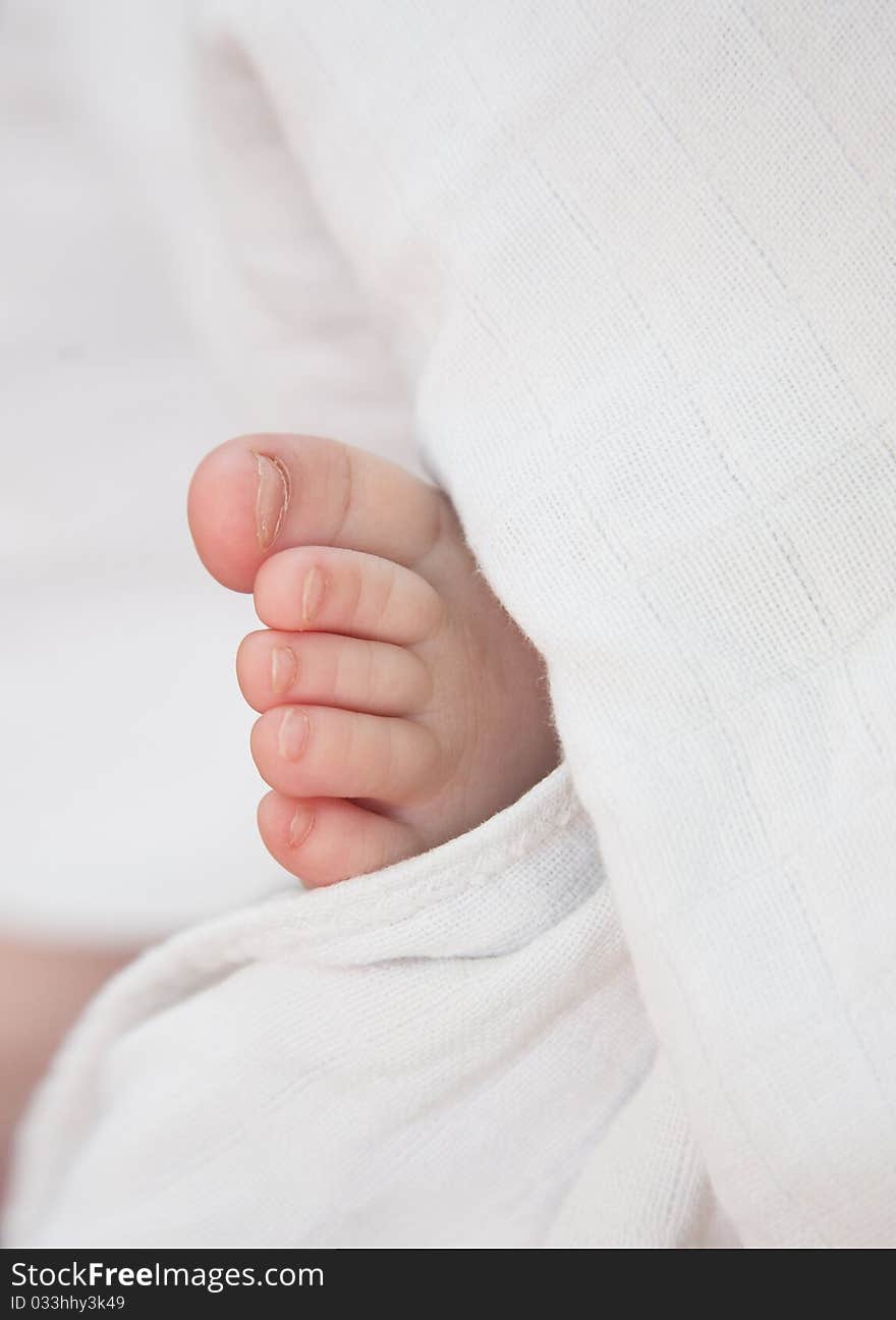 Baby leg, toes, white surround