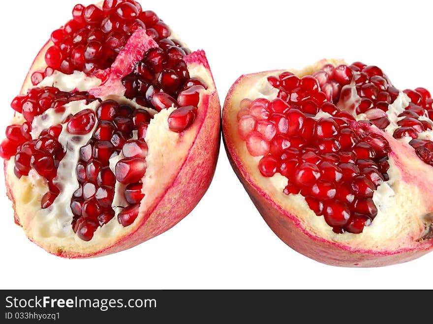 Half of pomegranate on a white background