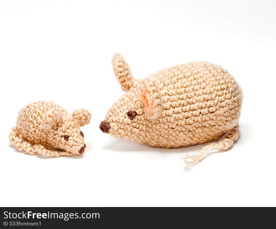 Crochetted handmade toy mice family.