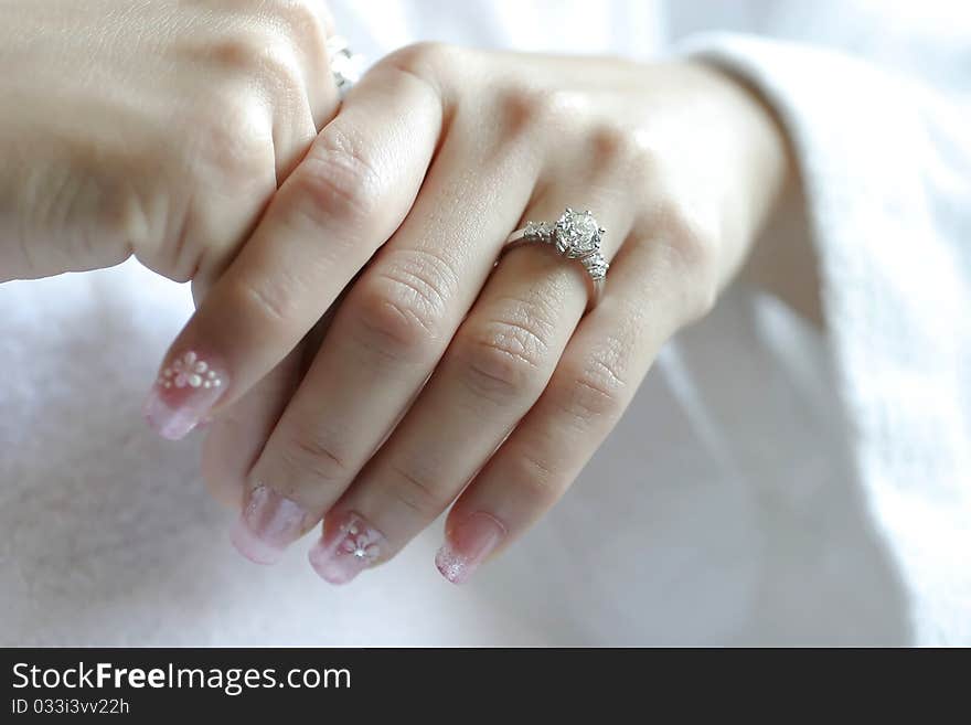 Wedding rings on hands of bride and groom, focus on rings. Wedding rings on hands of bride and groom, focus on rings