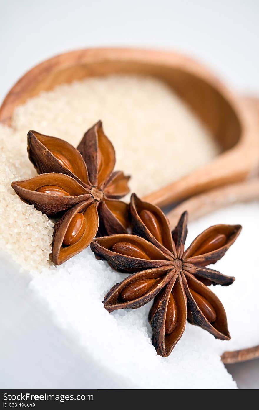 Star anise on white and brown sugar. Star anise on white and brown sugar.