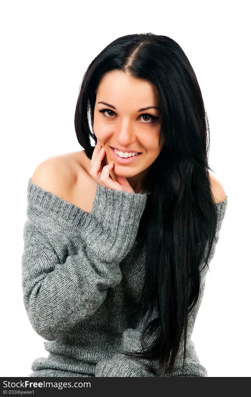 Portrait of a young woman with a long beautiful hair on white background