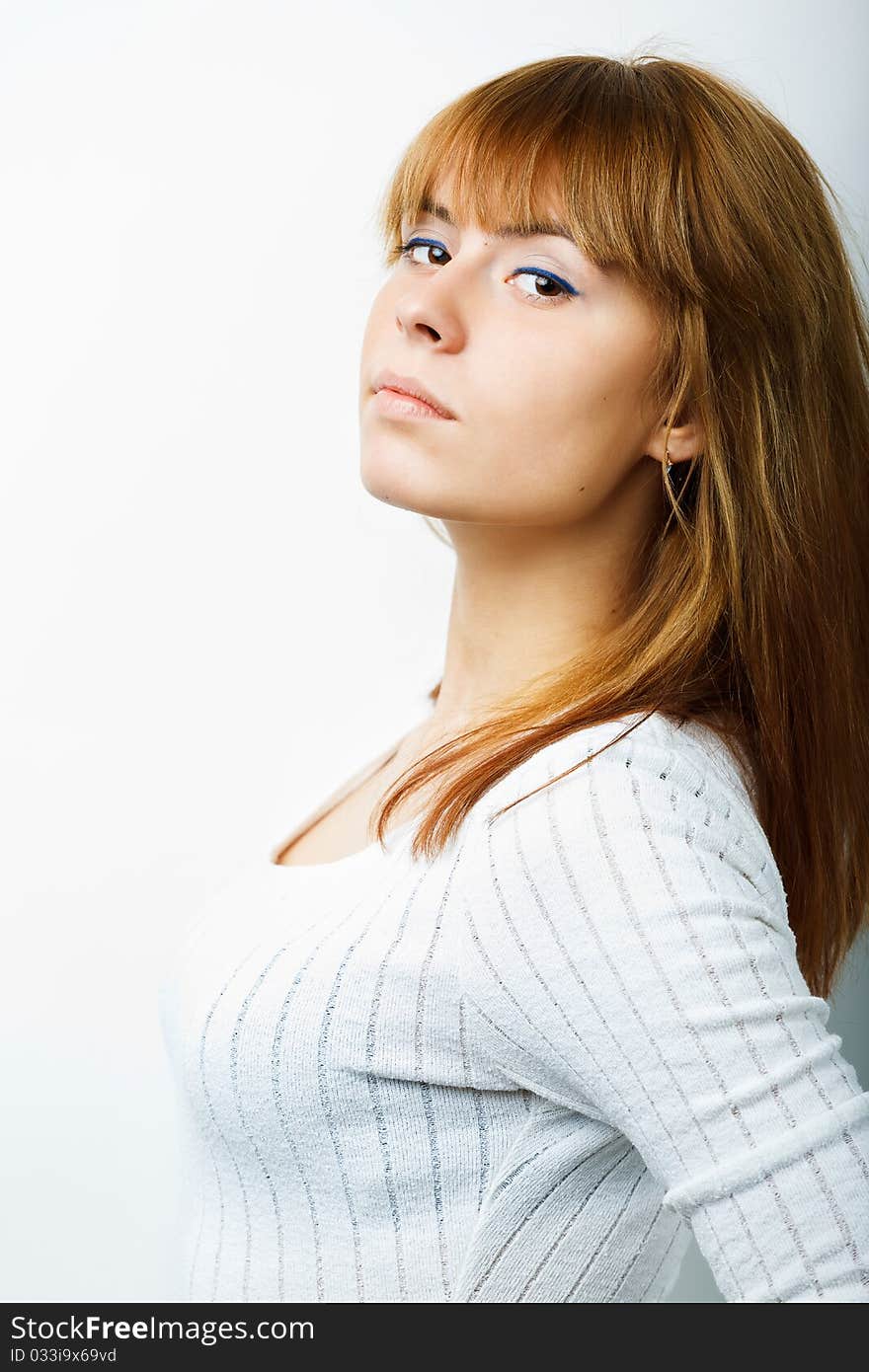 Portrait of a beautiful female model on white background