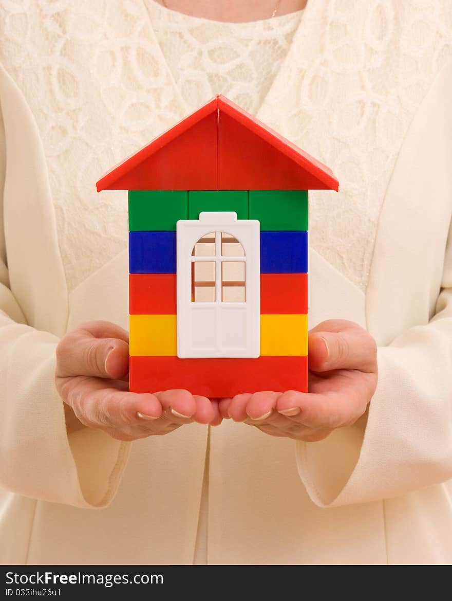 House on the hands on a white background. House on the hands on a white background.