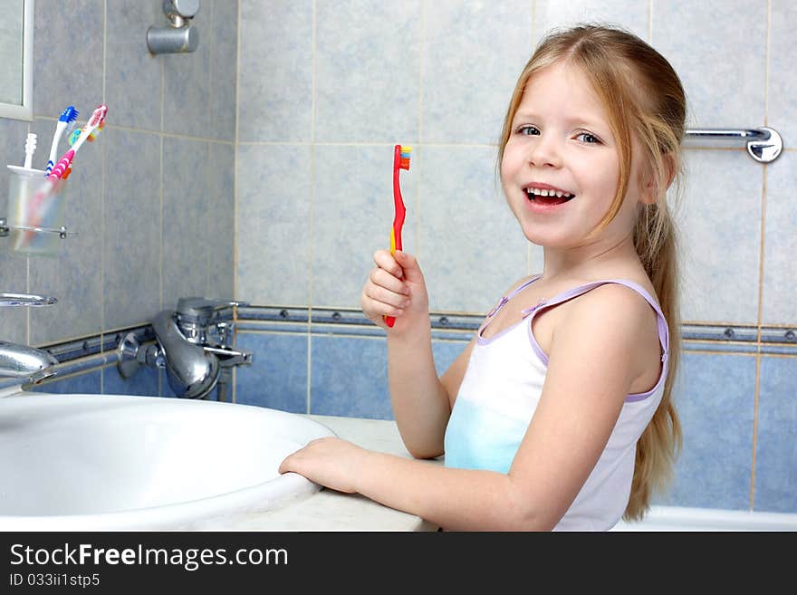 Little girl with toothbrush