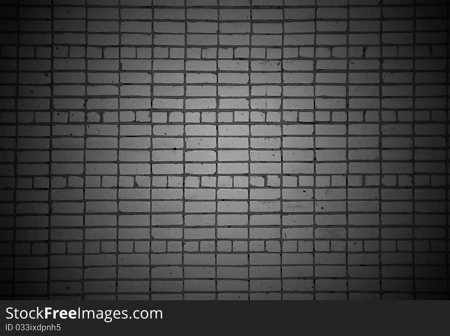 Old dark brick wall background