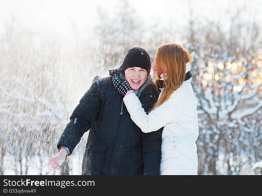 Young pair walks in wood, winter. Young pair walks in wood, winter