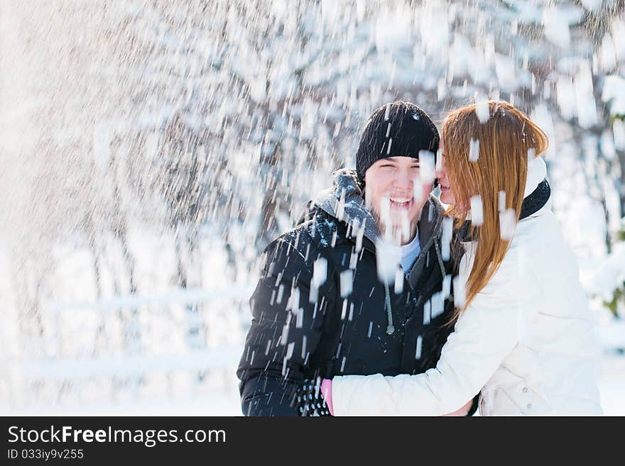 Young pair walks in wood, winter. Young pair walks in wood, winter