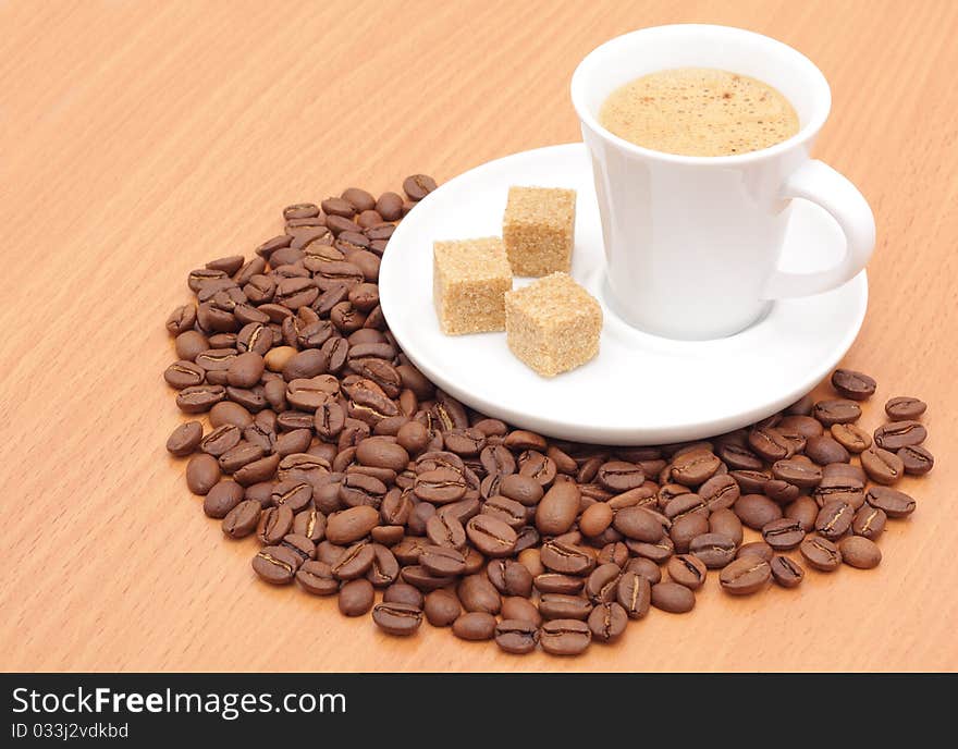 Coffee cup and grain on the table